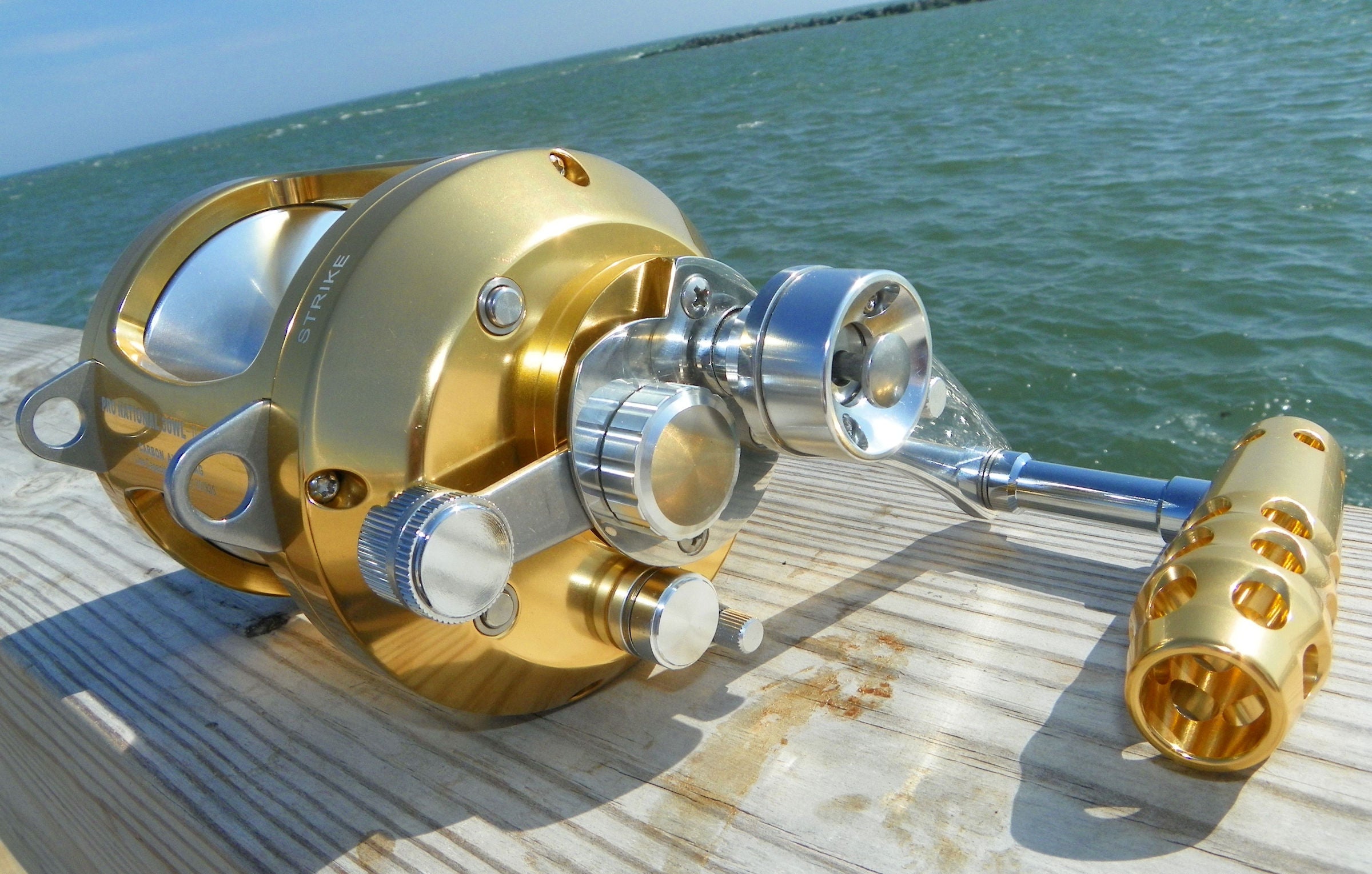 Okuma PCH TRB 5101H Curved Butt 80 to 150lb class & Okiaya 50W Twin Speed Lever Drag